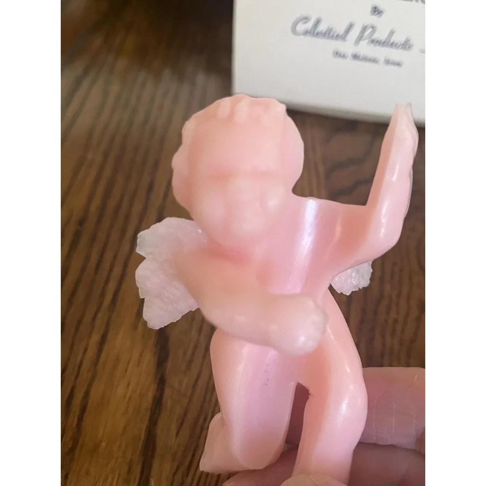 Celestial Seasonings candle cherubs